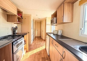 6 berth caravan for hire with decking at Manor Park in Norfolk ref 23017S