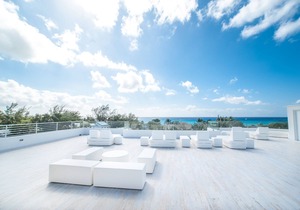 7 Mile Beach Penthouse with Private Beach Club. Ocean views from Roof Terrace.