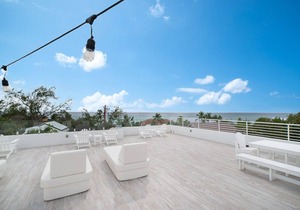 7 Mile Beach private Beach Club, ocean views from Roof deck and Pool Pavilion