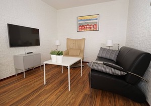 An absolute plus for this home is the party covered terrace facing south, with a comfortable, atmospheric lounge set.