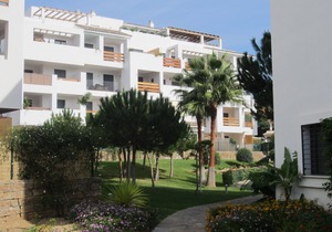Apartment in La Cala within a secure complex with large pool and lovely gardens