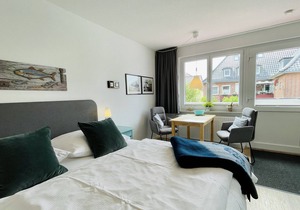 Apartment in the center of the pedestrian zone with a sunny south-facing balcony