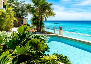 August Special oceanfront apartment Bellevue 1 with private sandy beach & pool