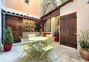 Beautiful apartment with patio in the heart of the village
