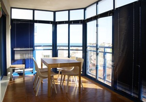 Bright apartment with pool on the beach.