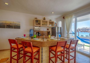 Bright and Affordable condo! Right on the beach with a pool!