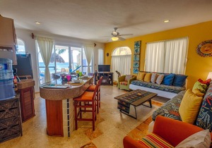 Bright and Affordable condo! Right on the beach with a pool!