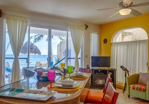 Bright and Affordable condo! Right on the beach with a pool!
