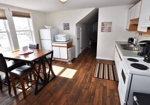 Bright One Bedroom Suite Has Peaked Ceilings with Tons of Character
