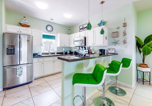 Bright Waterfront Home with Shared Pool, Water View, and High-Speed WiFi