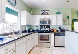 Bright Waterfront Home with Shared Pool, Water View, and High-Speed WiFi