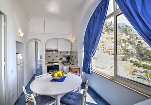 Casa Luisa: A charming ancient house overlooking the sea and the main beach of Positano, with Free WI-FI.