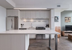 Chic 1BR Apt with Balcony and City Skyline Views