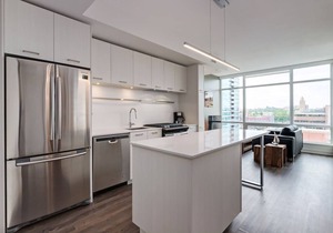 Chic 1BR Apt with Balcony and City Skyline Views