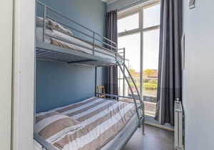 Complete, popular island house with steam shower. There is a lockable fence between the garden and t