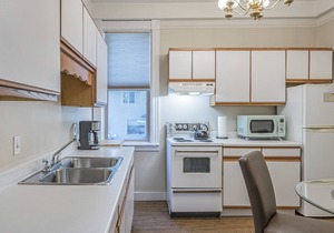 Cozy 1 bed/1 bath suite is on the 2nd level in the Historical Carew House