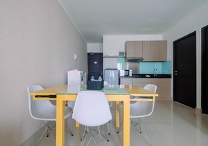 Cozy 2BR Apartment with Sofa Bed at Tamansari Semanggi By Travelio