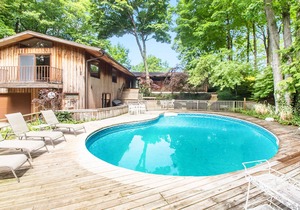 Dog-friendly lakefront house with private hot tub, outdoor pool, beach, WiFi