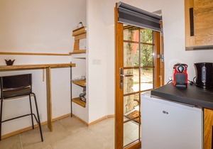 Enjoy a wonderful view of the countryside from the inviting vacation home with pool.