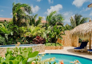 Fabulous modern 2-bedroom apartment with tropical garden, pool and whirlpool