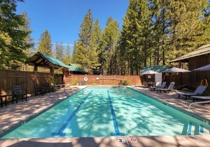 Fir - king bedroom with couch at The Inn At Mazama