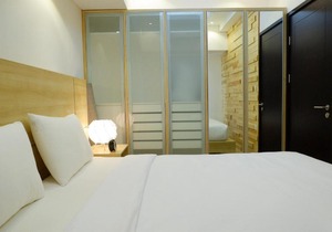 Futuristic 1BR Casa De Parco Apartment near ICE BSD By Travelio