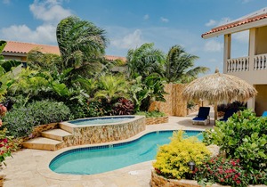 Gorgeous modern 1-bedroom apartment with tropical garden, pool and whirlpool