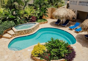 Gorgeous modern 1-bedroom apartment with tropical garden, pool and whirlpool