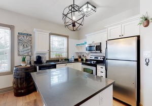 Ground floor condo, fireplace, private washer/dryer, and seasonal pool