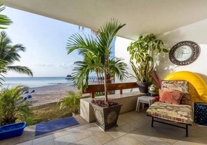 Ground Floor Corner Unit Directly on the Beach