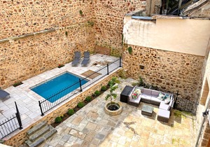 Historic 16th-Century Cottage with Pool, Courtyard & Modern Amenities in Charming Village