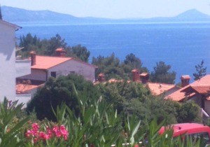 Holiday apartment with terrace and sea view