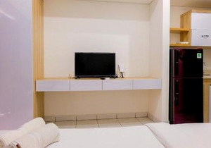 Homey Studio at Casa De Parco Apartment By Travelio