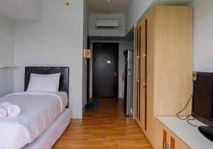 Homey Studio Room at Casa De Parco Apartment By Travelio