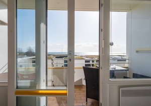 Inselblume 76 - vacation home with sea view in Burgtiefe
