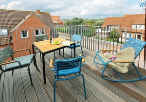Juist vacation with sunny roof terrace and private sauna!