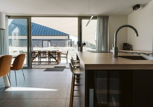Luxuriously equipped with wood stove, wine cooler, and sun shower