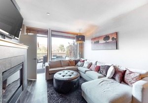 Luxury mountain-view condo with fireplace, balcony, indoor pool & hot tub