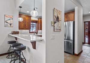 Magnificent multi level 3 bedroom + den townhouse, close to Morrisey lift