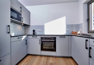 MODERN SUITE - 82sqm 1st floor - opt. 2 pers. - south-facing balcony, WLAN; NEW! SAUNA HOUSE!