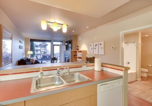 Mountain-view condo with indoor pool & hot tub, private balcony & grill