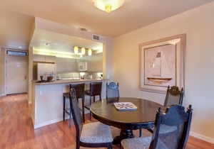 Mountain-view condo with indoor pool & hot tub, private balcony & grill