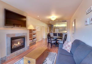 Mountain-view condo with indoor pool & hot tub, private balcony & grill
