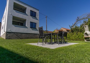 New comfort apartment with garden, terrace and barbecue. Feeling good included.