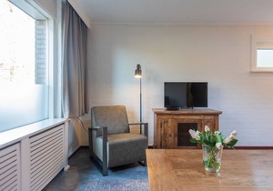Nice bungalow with washing machine at a holiday park in a natural area