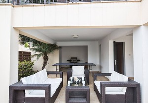 Picture Relaxing Beside Your Private Pool in Protaras Reading Your Favourite Book