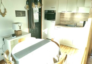 Pure relaxation right by the forest & only 750m to the beach in our retro chalet