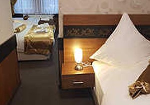 Quadruple Room (1 double bed, 2 single beds), incl. Breakfast - Hotel Im Anker