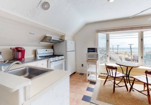 Second Floor Condo with Ocean View, High-Speed WiFi, & Rooftop Deck!