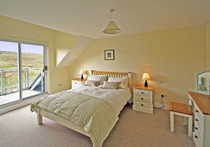 Semi-detached stone cottage, in the attractive village of Cleggan (local crabs and lobsters) a…